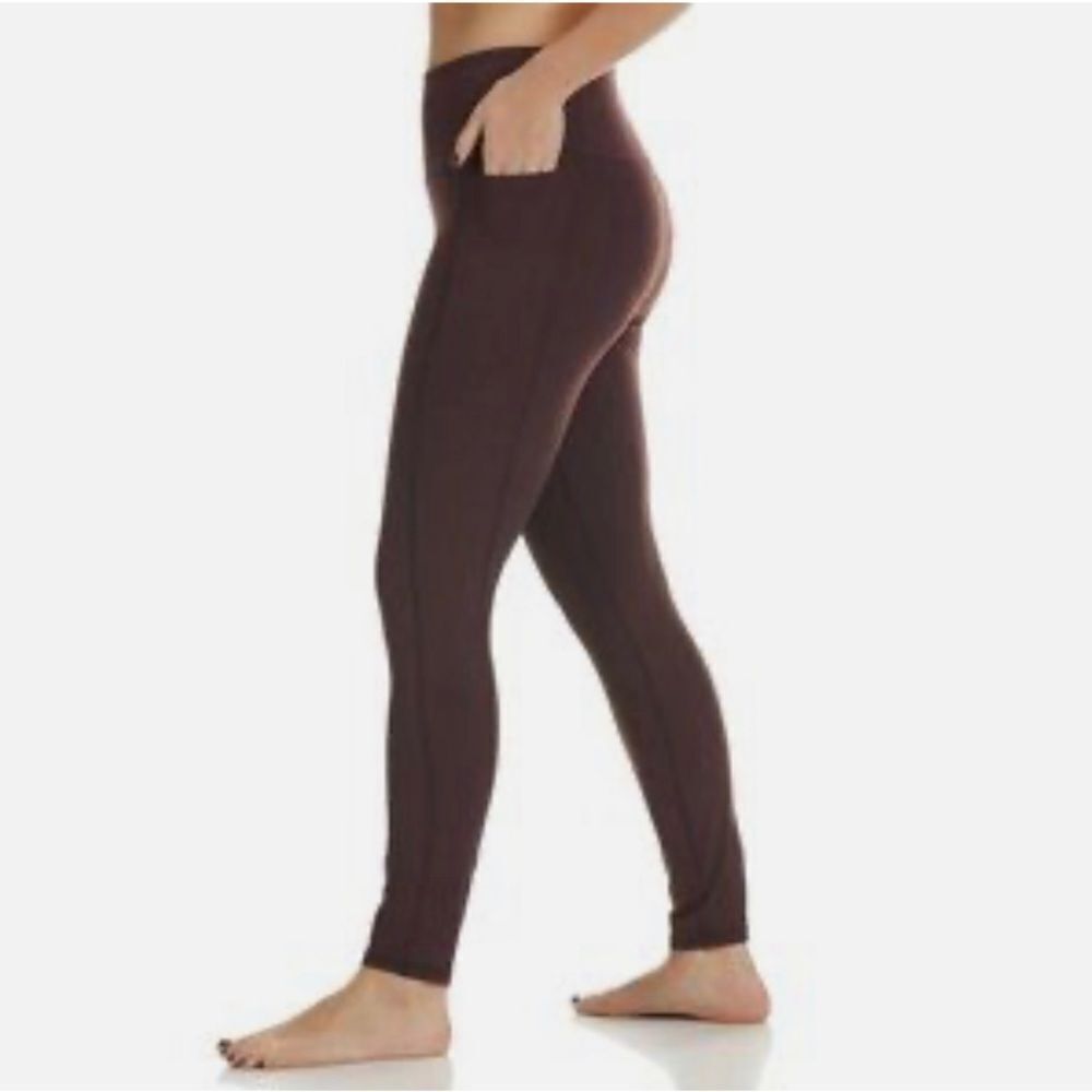 Spyder women’s performance burgundy leggings size medium.